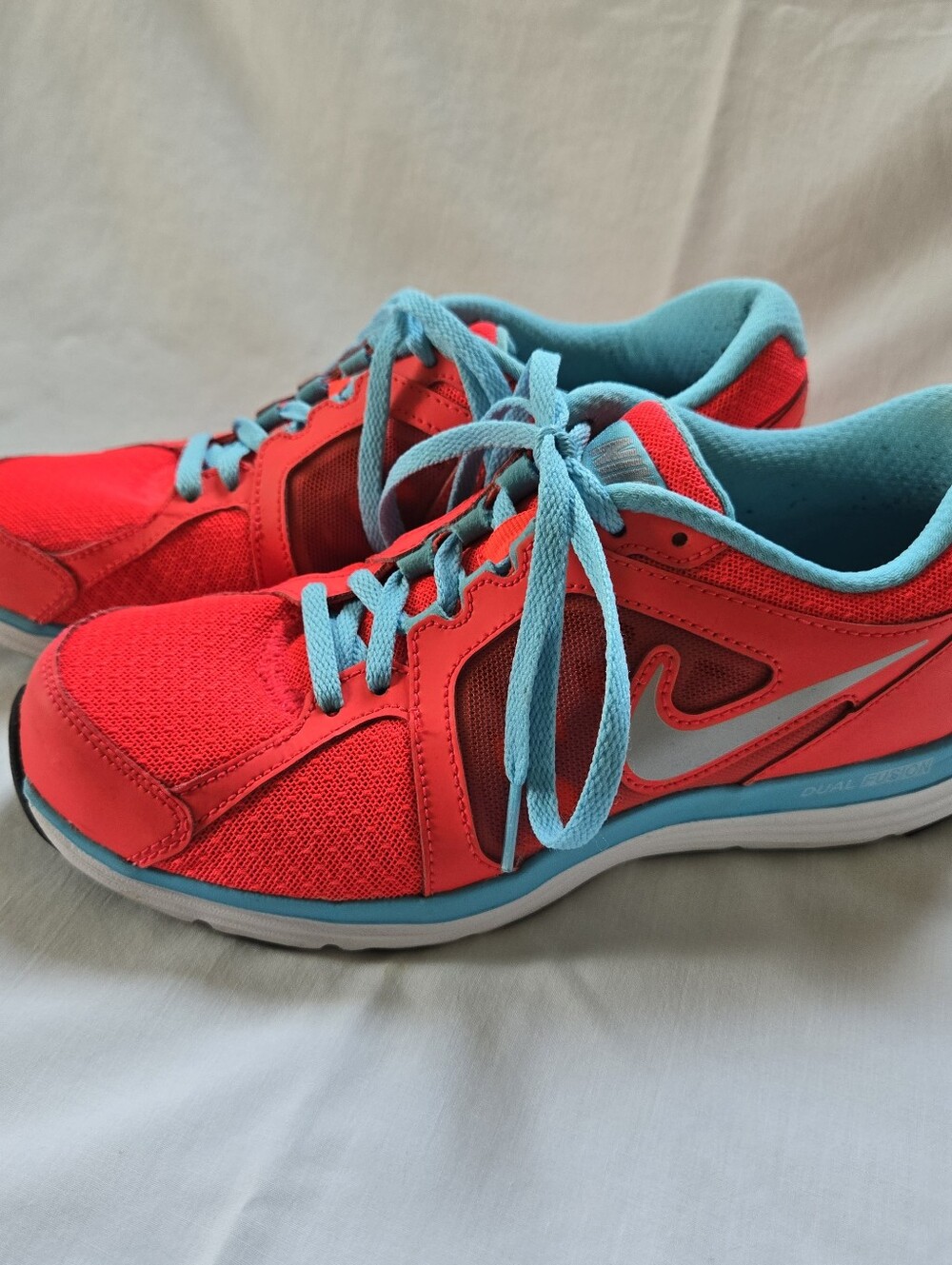 Nike Women’s Bright Coral and Light Blue Athletic Sneakers